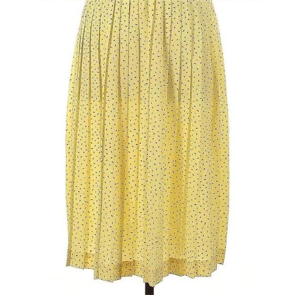 Yellow midi accordion skirt with navy sprinkles. - Picture 1 of 3